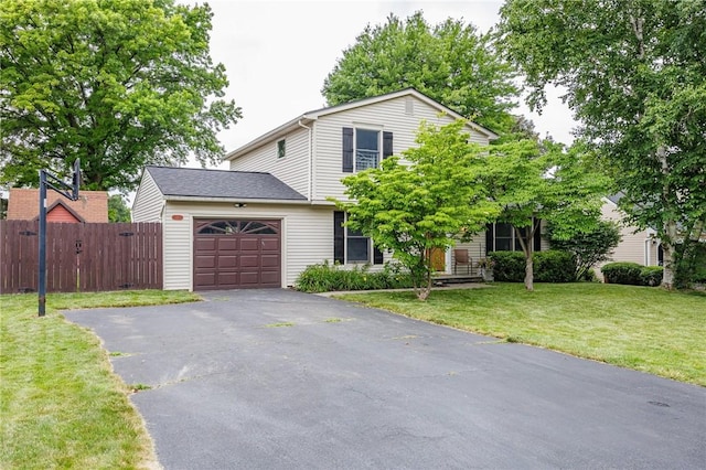 25 Killdeer Ln, Perinton, NY 14450 - view of front of home featuring asphalt driveway and an attached garage