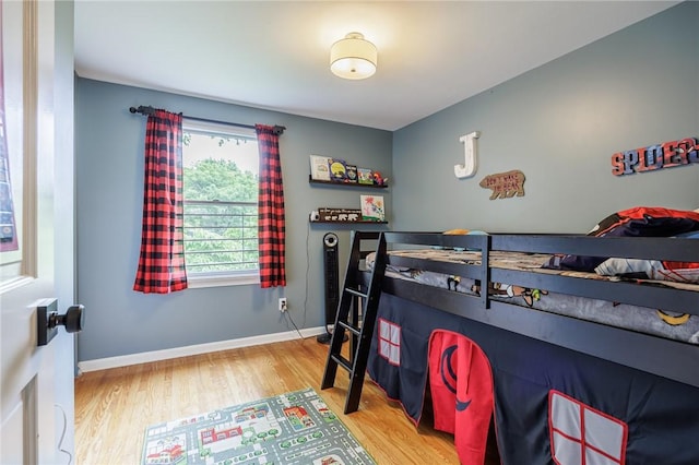 25 Killdeer Ln, Perinton, NY 14450 - bedroom featuring wood finished floors and baseboards
