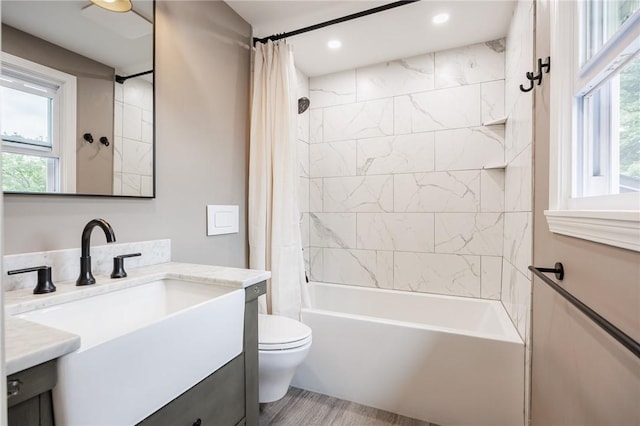 25 Killdeer Ln, Perinton, NY 14450 - full bath featuring vanity, shower / tub combo with curtain, healthy amount of natural light, recessed lighting, and wood finished floors