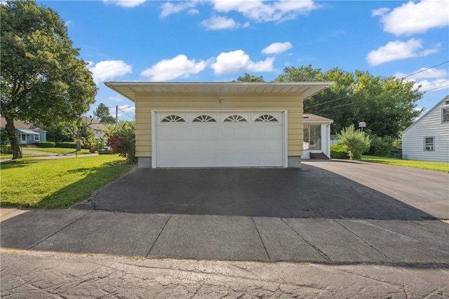 24 Gray St, Rochester, NY 14609 - garage with asphalt driveway