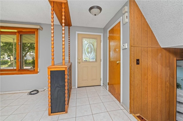 24 Gray St, Rochester, NY 14609 - foyer with a textured ceiling and light tile patterned floors