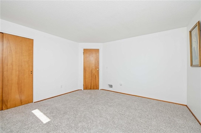 24 Gray St, Rochester, NY 14609 - spare room with carpet floors