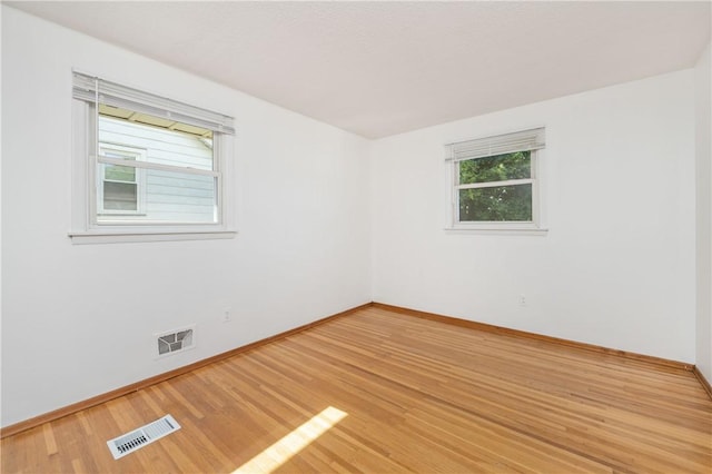 24 Gray St, Rochester, NY 14609 - spare room with baseboards and light wood-style floors