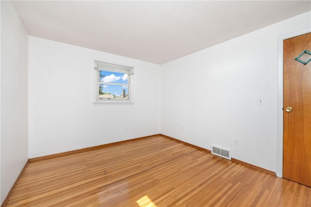 24 Gray St, Rochester, NY 14609 - empty room featuring light wood-type flooring and baseboards