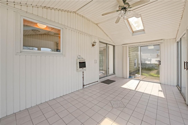 24 Gray St, Rochester, NY 14609 - unfurnished sunroom with heating unit, ceiling fan, a skylight, and lofted ceiling