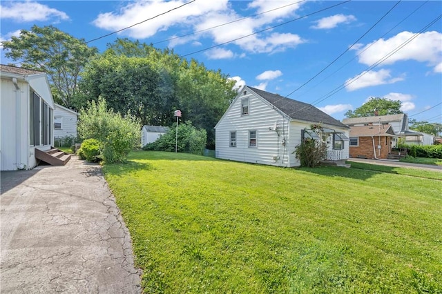 24 Gray St, Rochester, NY 14609 - view of home's exterior featuring a yard