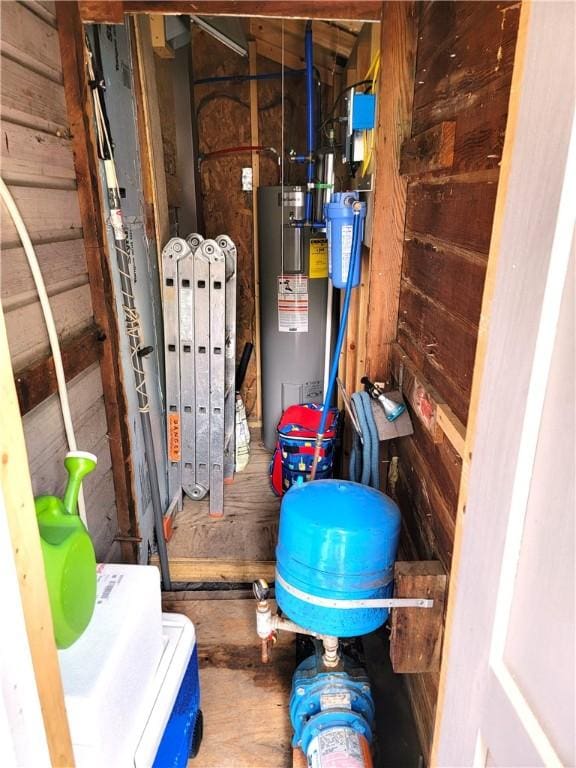 3904 Castle Point Rd, Starkey, NY 14842 - utility room featuring electric water heater