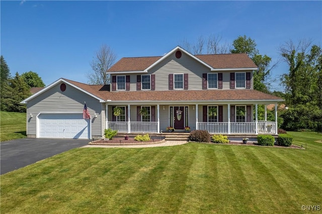 121 Ben Bar Cir, Whitestown, NY 13492 - view of front of home with a porch, an attached garage, asphalt driveway, and a front yard