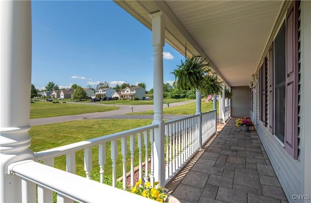 121 Ben Bar Cir, Whitestown, NY 13492 - covered porch featuring a residential view