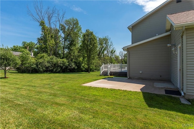 121 Ben Bar Cir, Whitestown, NY 13492 - view of green lawn with a patio area and a wooden deck