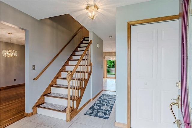 121 Ben Bar Cir, Whitestown, NY 13492 - foyer with a chandelier, stairway, and light tile patterned floors