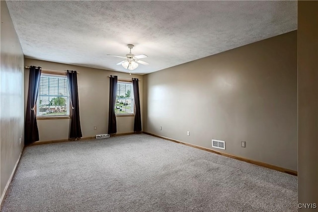 121 Ben Bar Cir, Whitestown, NY 13492 - spare room with a ceiling fan, a textured ceiling, and carpet floors