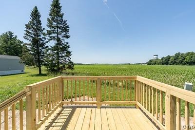 27634 County Route 342, Le Ray, NY 13612 - wooden deck with a view of countryside and agricultural plots