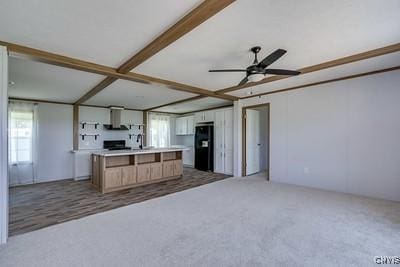 27634 County Route 342, Le Ray, NY 13612 - kitchen with freestanding refrigerator, open floor plan, light countertops, a ceiling fan, and carpet floors