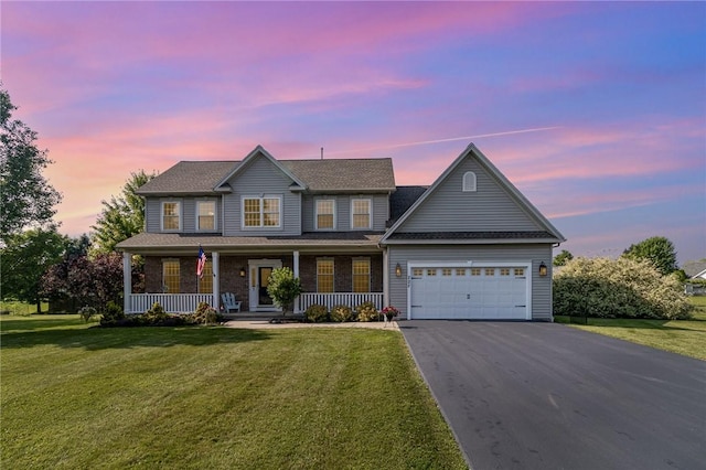 228 Southshore Pl, Webster, NY 14580 - view of front facade featuring driveway, a garage, a porch, and a front lawn