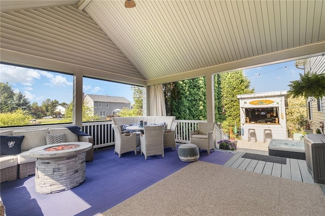 228 Southshore Pl, Webster, NY 14580 - view of patio / terrace with a fire pit, outdoor dining space, and a fireplace