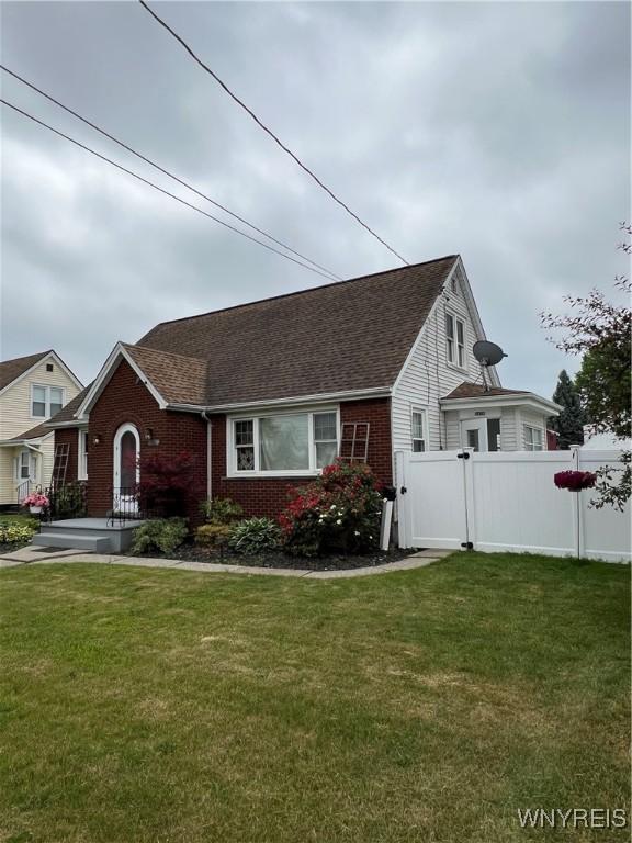 2479 Forest Ave, Niagara Falls, NY 14301 - view of front of home featuring brick siding and roof with shingles