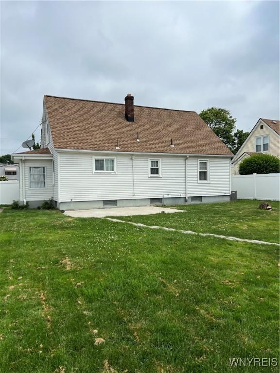 2479 Forest Ave, Niagara Falls, NY 14301 - back of house with a chimney and a shingled roof
