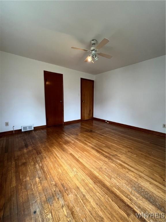 2479 Forest Ave, Niagara Falls, NY 14301 - unfurnished room with ceiling fan and wood-type flooring