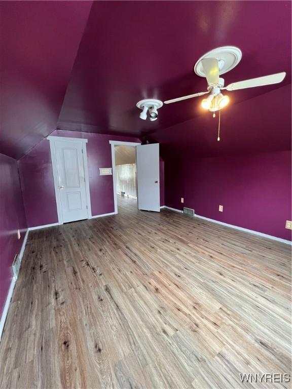 2479 Forest Ave, Niagara Falls, NY 14301 - bonus room featuring lofted ceiling, wood finished floors, and a ceiling fan