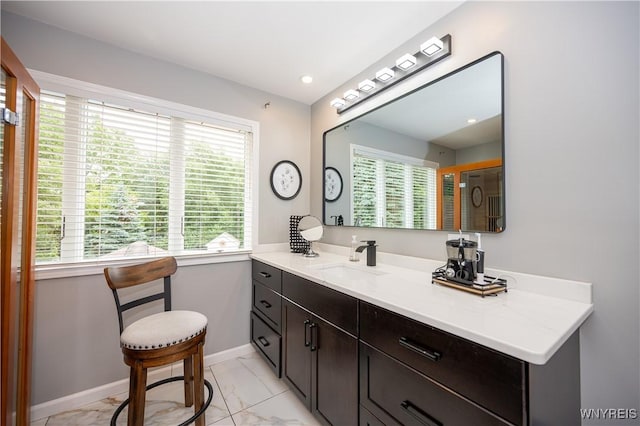 9 Rolling Woods Ln Unit E, West Seneca, NY 14224 - bathroom with marble look tiles and vanity