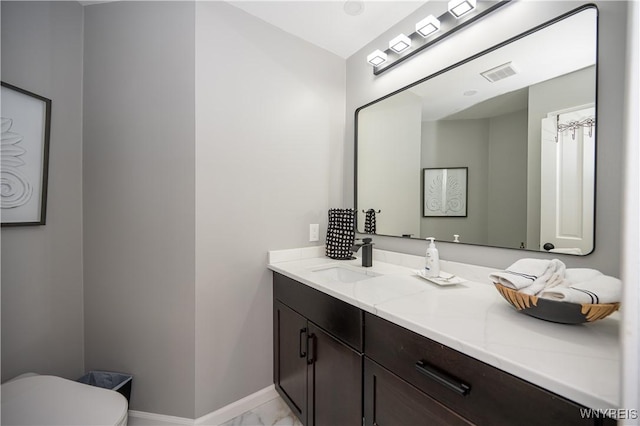 9 Rolling Woods Ln Unit E, West Seneca, NY 14224 - bathroom featuring vanity and marble look tiles