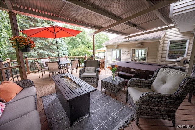 9 Rolling Woods Ln Unit E, West Seneca, NY 14224 - deck with outdoor dining area, a covered hot tub, and an outdoor living space with a fire pit