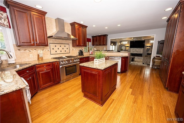 9 Rolling Woods Ln Unit E, West Seneca, NY 14224 - kitchen with wall chimney range hood, high end stainless steel range oven, dishwasher, dark brown cabinets, and light wood finished floors