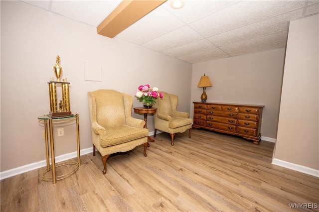 9 Rolling Woods Ln Unit E, West Seneca, NY 14224 - sitting room with light wood-style flooring and a paneled ceiling