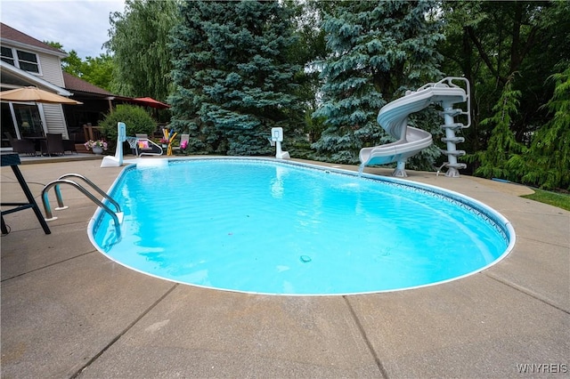 9 Rolling Woods Ln Unit E, West Seneca, NY 14224 - outdoor pool with a water slide and a patio
