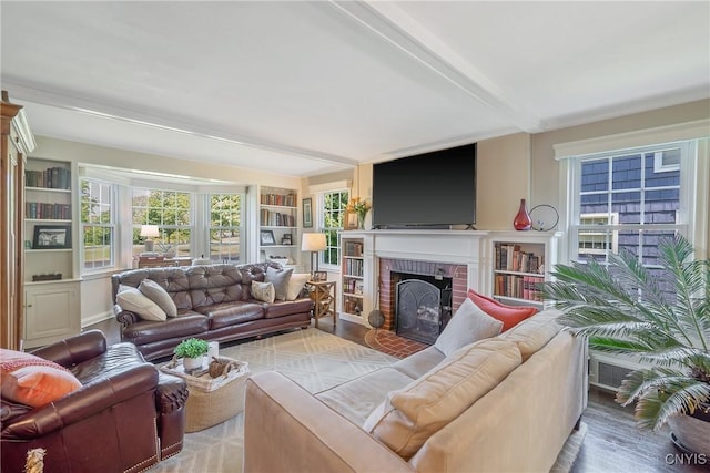 200 Halton Rd, Dewitt, NY 13224 - living room featuring a fireplace, light wood-style floors, and beamed ceiling