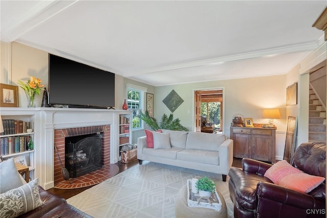 200 Halton Rd, Dewitt, NY 13224 - living area featuring wood finished floors, a brick fireplace, stairway, and crown molding