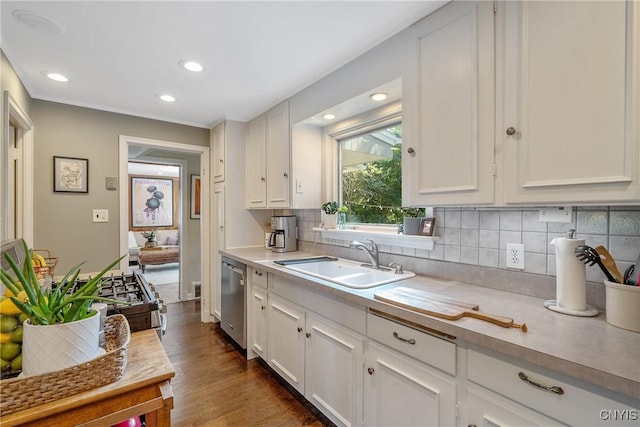 200 Halton Rd, Dewitt, NY 13224 - kitchen featuring light countertops, white cabinets, decorative backsplash, dishwasher, and recessed lighting