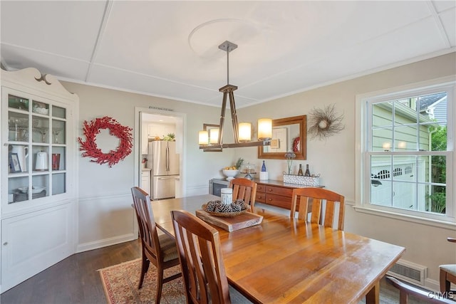 200 Halton Rd, Dewitt, NY 13224 - dining space with dark wood-style floors and crown molding