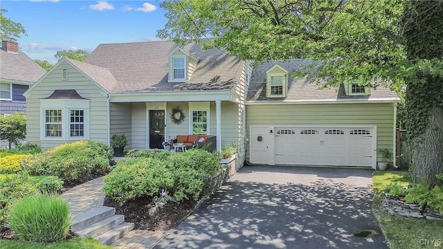 200 Halton Rd, Dewitt, NY 13224 - new england style home featuring concrete driveway and a garage