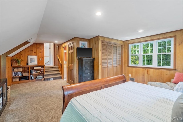 200 Halton Rd, Dewitt, NY 13224 - carpeted bedroom with wood walls, lofted ceiling, and recessed lighting