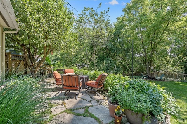 200 Halton Rd, Dewitt, NY 13224 - fenced backyard with a patio