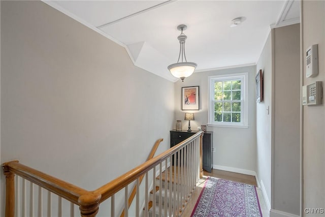 200 Halton Rd, Dewitt, NY 13224 - hall with an upstairs landing, crown molding, and wood finished floors