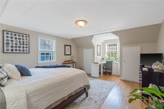 200 Halton Rd, Dewitt, NY 13224 - bedroom featuring light wood finished floors, an office area, and vaulted ceiling
