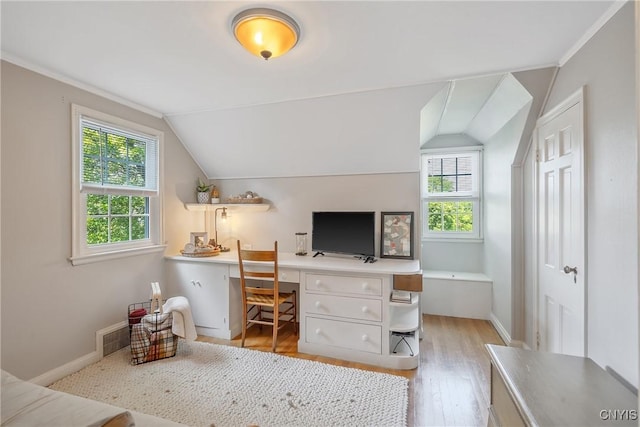 200 Halton Rd, Dewitt, NY 13224 - bedroom featuring multiple windows, light wood finished floors, built in study area, and vaulted ceiling