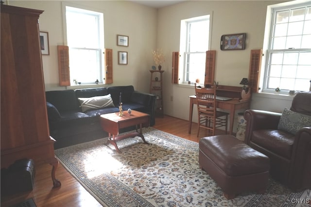 64 Bunner St, Oswego, NY 13126 - living room with wood finished floors