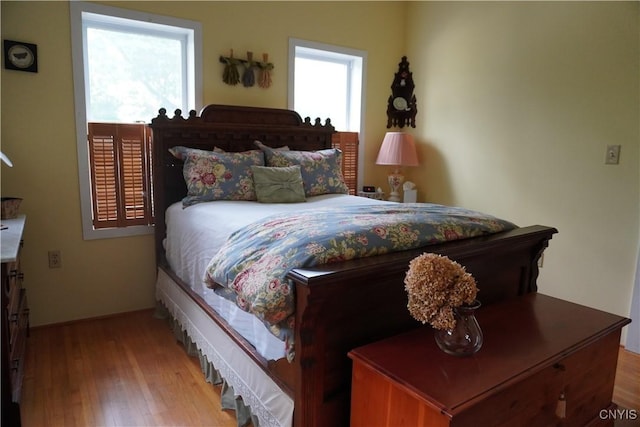 64 Bunner St, Oswego, NY 13126 - bedroom with wood finished floors