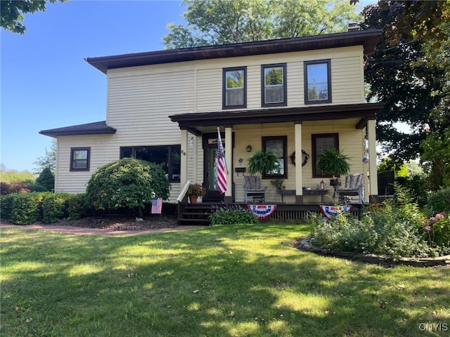 64 Bunner St, Oswego, NY 13126 - view of front of home featuring a porch, a front yard, and a chimney