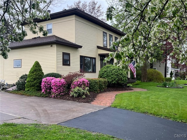 64 Bunner St, Oswego, NY 13126 - view of property exterior with a yard
