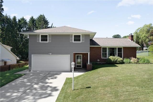5 Tudor Dr, Owego, NY 13760 - split level home with a garage, concrete driveway, brick siding, and a chimney
