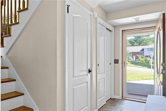 5 Tudor Dr, Owego, NY 13760 - entryway featuring stairs and stone finish floors