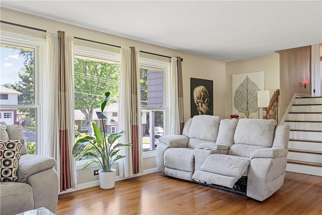 5 Tudor Dr, Owego, NY 13760 - living room with wood finished floors, healthy amount of natural light, and stairs