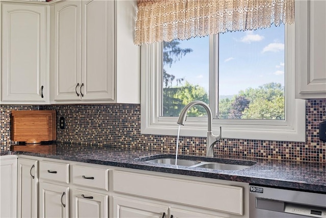 5 Tudor Dr, Owego, NY 13760 - kitchen with dishwasher, decorative backsplash, white cabinetry, and plenty of natural light