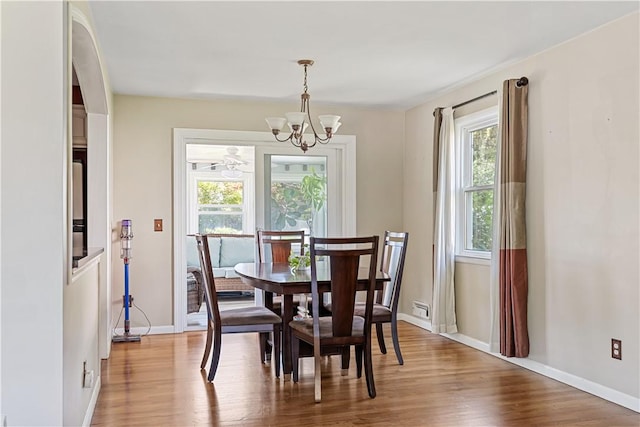 5 Tudor Dr, Owego, NY 13760 - dining room with plenty of natural light, a chandelier, and wood finished floors