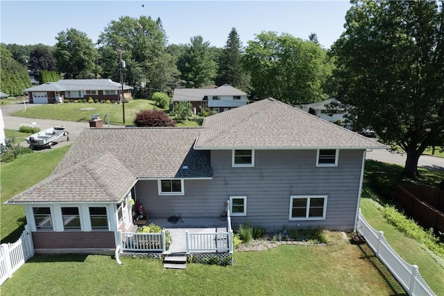 5 Tudor Dr, Owego, NY 13760 - rear view of house featuring a shingled roof, a fenced backyard, and a wooden deck